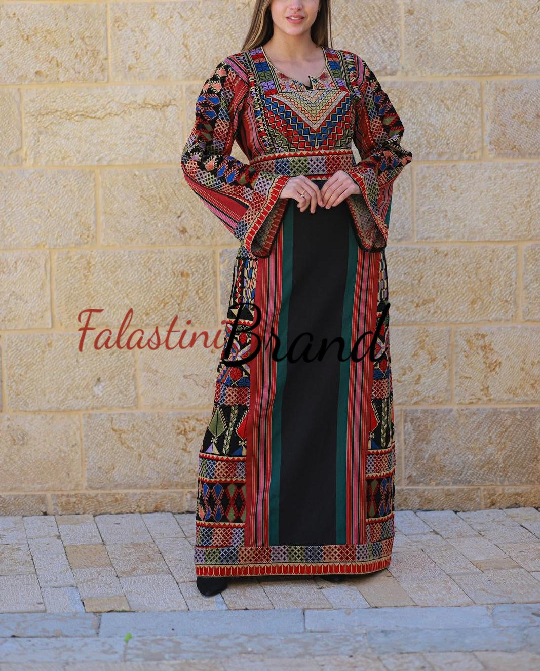 Trendy Black Majdalawi Fabric Thob with Colorful Embroidery 48/(3XL) Trendy Black Majdalawi Fabric Thob with Colorful Embroidery 48/(3XL)