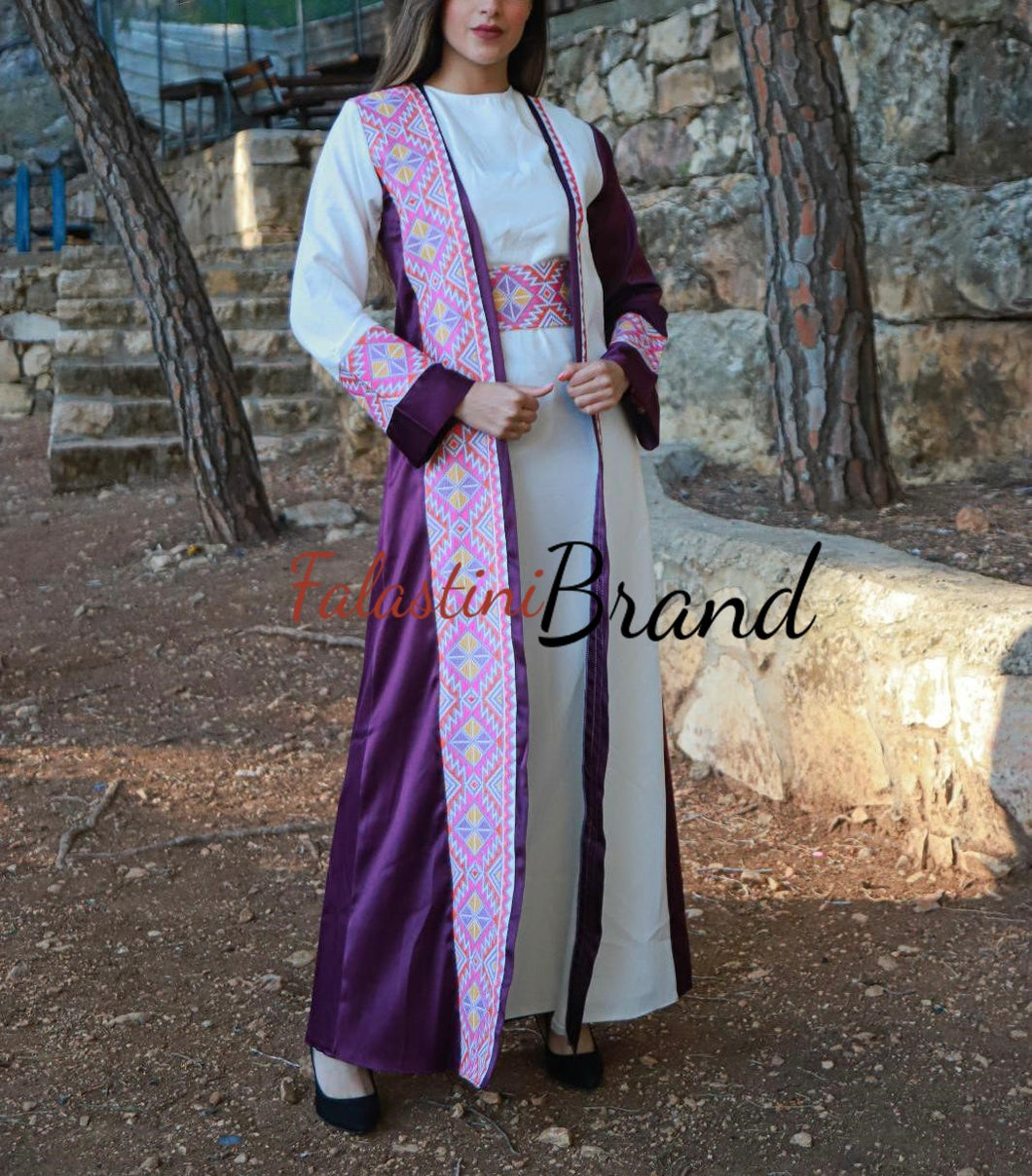 Elegant Purple and White Dress and Abaya Set with Palestinian Embroidery and Satin Details Elegant Purple and White Dress and Abaya Set with Palestinian Embroidery and Satin Details